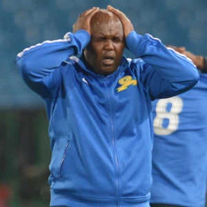 PRETORIA, SOUTH AFRICA - DECEMBER 20: Pitso Mosimane  looks dejected during the Absa Premiership match between Mamelodi Sundowns and Maritzburg United at Loftus Stadium on December 20, 2013 in Pretoria, South Africa. (Photo by Lefty Shivambu/Gallo Images)