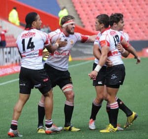 JOHANNESBURG, SOUTH AFRICA - OCTOBER 17: Try scorer,Jaco Kriel of the Lions celebrates with his team mates during the Absa Currie Cup semi final match between Xerox Golden Lions and Toyota Free State at Emirtates Airline Park on October 17, 2015 in Johannesburg, South Africa. (Photo by Lee Warren/Gallo Images/Getty Images)